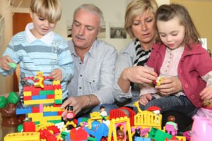 Grandparents and grandchildren playing together